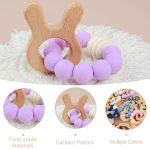 Baby beech wood rabbit teether with purple silicone beads shown from multiple angles