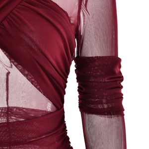 Detail showing ruched mesh texture and waist cut-out on burgundy bodycon dress