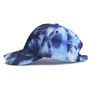 Blue and white tie-dye gradient baseball cap with adjustable strap and curved brim