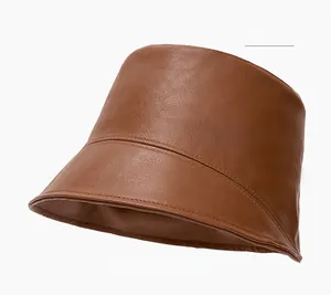 Detailed view of khaki PU leather bucket hat with reinforced stitching and pebbled texture