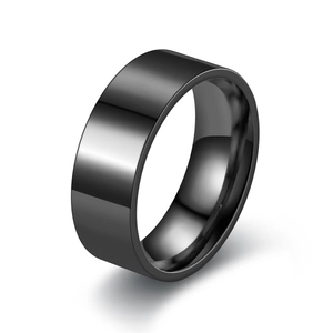 Minimalist 8mm black titanium steel ring with polished flat surface in floating display