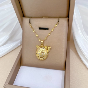 Golden lucky cat necklace with rhinestones displayed in a premium beige jewelry gift box