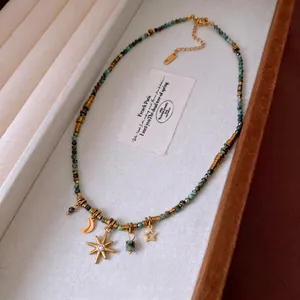 Retro titanium steel beaded necklace with celestial moon star pendants and turquoise beads