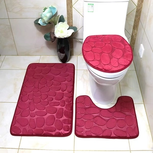 Red 3-piece bathroom mat set with pebble texture including U-shape and lid cover