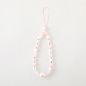 Handmade phone charm with pink and white pearls, frosted beads and a bow-knot decoration