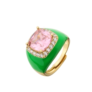 Gold brass geometric ring with pink cushion cut stone and green enamel finish