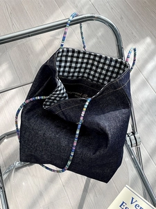 Vintage denim tote bag with colorful woven handles and black gingham lining for women