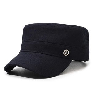 Men's flat top mesh sun hat in black with a good luck metal badge and breathable side panels