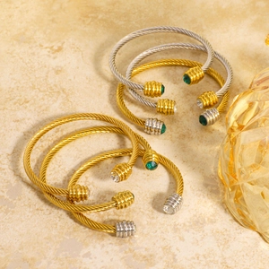 Set of twisted cable wire bracelets in gold and silver finish with colorful gemstones
