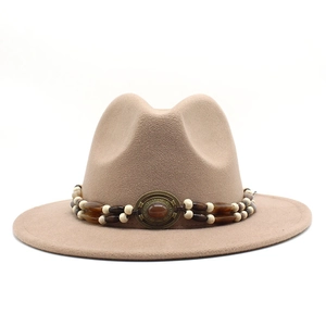 Detail of khaki wool fedora hat with double-layered beads and vintage bronze buckle
