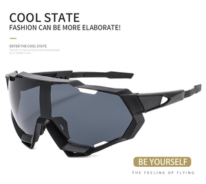 Detail view of matte black cycling glasses with large grey anti-wind sports lenses