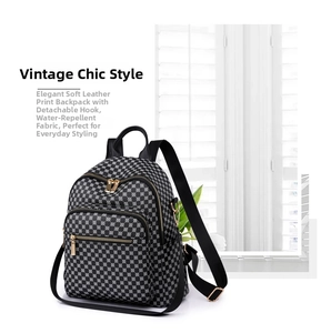 Detail of waterproof soft leather backpack with geometric pattern and detachable hook