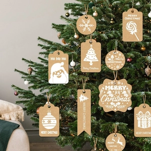Christmas kraft paper gift tags set with white holiday patterns on a festive tree