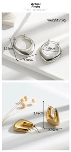 Detailed size specifications for minimalist silver teardrop and golden U-shaped earrings