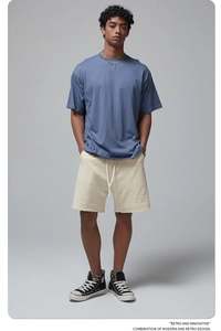 Men's oversized blue cotton t-shirt and beige drawstring shorts casual set