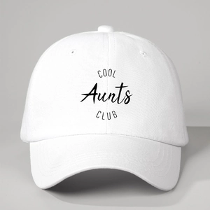 Detailed macro view of black COOL Aunts CLUB print on white cotton canvas baseball cap