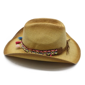 Ethnic straw jazz hat with colorful geometric band and tassels in a classic cowboy style