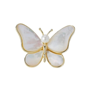 Elegant gold butterfly brooch with iridescent white shell wings and a pearl accent