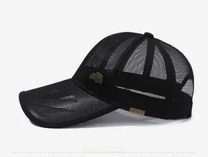 Detail of black mesh baseball cap featuring side vintage metal car pin and SPORT tag