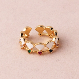 Detail showing gold-plated fan-shaped enamel charms with colorful cubic zirconia stones