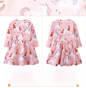 Detail of pink long sleeve girls' dress with colorful unicorn print and soft cotton fabric