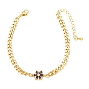 Gold flower bracelet with black and clear cubic zirconia on a minimalist cuban chain