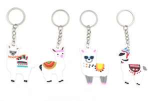 Set of four cute cartoon PVC alpaca keychains with colorful patterns and metal rings
