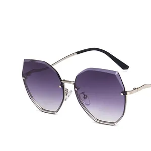 Lunettes de soleil polygonales sans monture avec verres dégradés violets chic