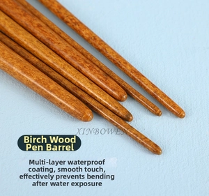 Detail of birch wood handles with multi-layer waterproof coating for art brushes