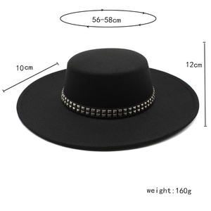 Black wool boater hat with 10cm wide brim and punk metal rivet decoration