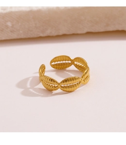 Macro view of adjustable gold-plated stainless steel ring with shell texture design