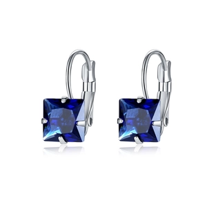 Close-up of square cut navy blue zircon earrings with silver lever-back setting