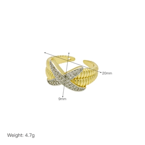 Macro view of X-shaped two-tone crossover ring with dimensions 20mm and weight 4.7g