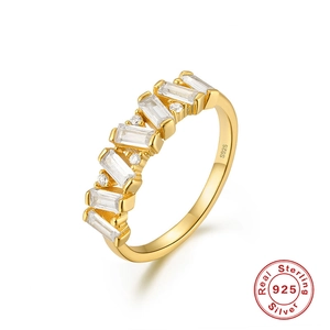Detail macro view of S925 sterling silver stamp on luxurious gold-plated baguette ring