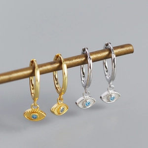 S925 silver devil's eye huggie earrings with blue crystals in gold and silver finishes