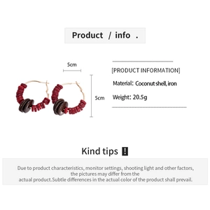 Detail view of ethnic coconut shell beaded hoop earrings with a size of 5cm and 20.5g