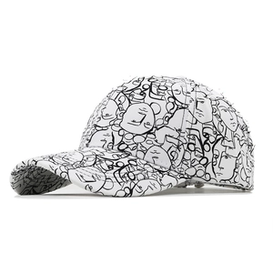 White baseball cap with black abstract line art face prints and a curved brim