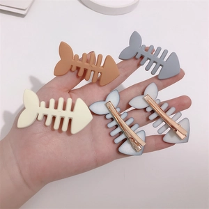 Set of 5 colorful fish bone hair clips in candy colors with gold metal duckbill clips