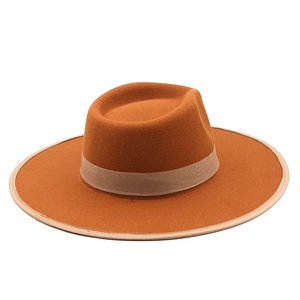 Two-tone cashmere fedora hat with wide brim and decorative ribbon trim in caramel and beige
