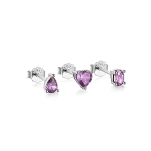 Macro shot of S925 silver stud earrings set with heart and oval purple zircon stones