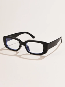 Detail view of vintage rectangle sunglasses featuring thick black frames and blue light lenses