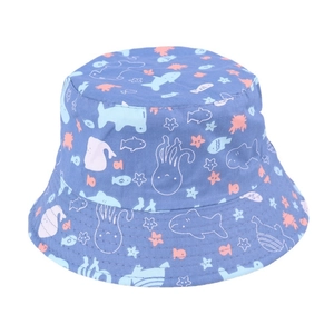 Close-up of kids navy sun hat featuring cartoon octopus and whale nautical prints