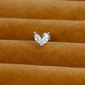 Macro detail of silver leaf zircon stud with ball screw back on velvet stand