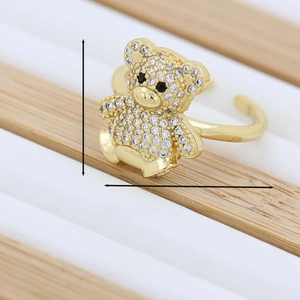 Golden sitting bear ring with rainbow cubic zirconia and adjustable opening design