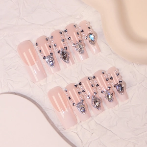 Luxury long square press-on nails with nude base, crystal rhinestones and pearls