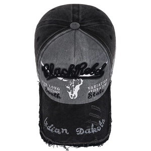Vintage washed five-panel baseball cap with distressed edges and embroidery
