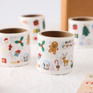 Cute Christmas cartoon stickers roll featuring gingerbread man and reindeer patterns