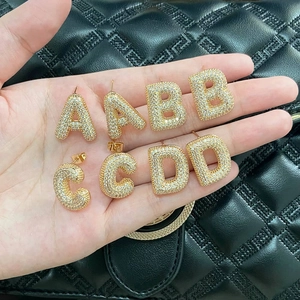 Gold plated alphabet stud earrings with sparkling white cubic zirconia letters A-D