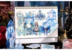 Blue fantasy PET stickers featuring chandeliers and butterflies on a spiral notebook
