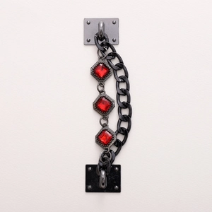 Dual-row black metal chain furniture handle with three red gemstone accents for DIY decor